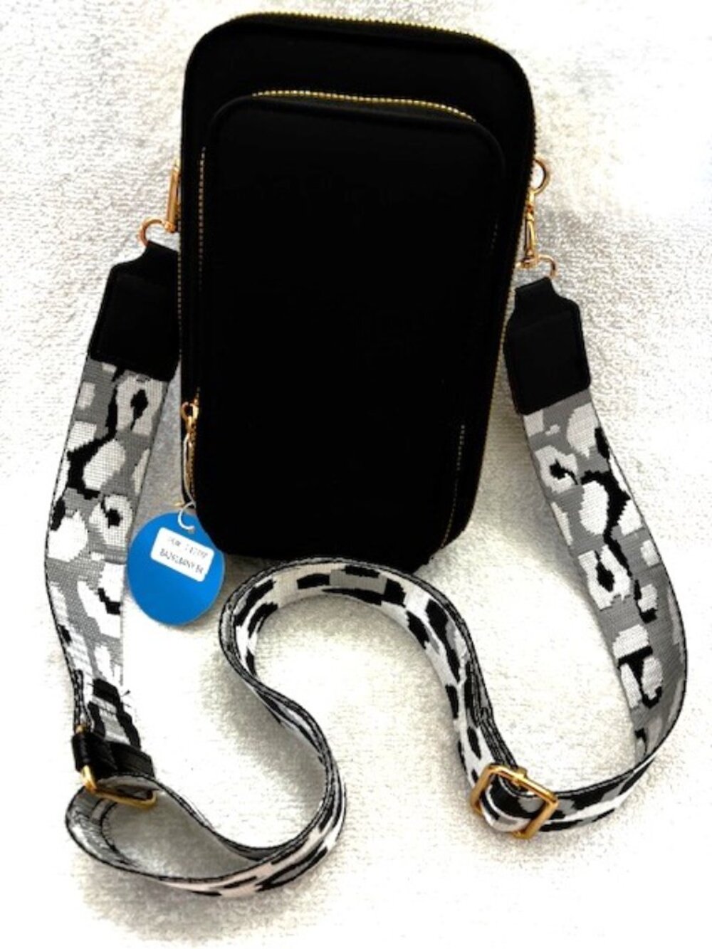 Black nylon crossbody zip close 3-section bag, adjustable animal print strap NWT